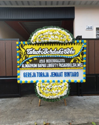 Papan Bunga Duka di Suka Bangun